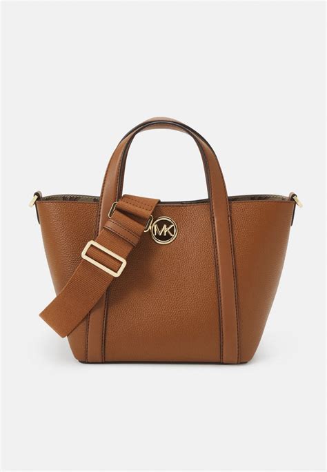 michael kors garantie sac|michael kors suitcase warranty.